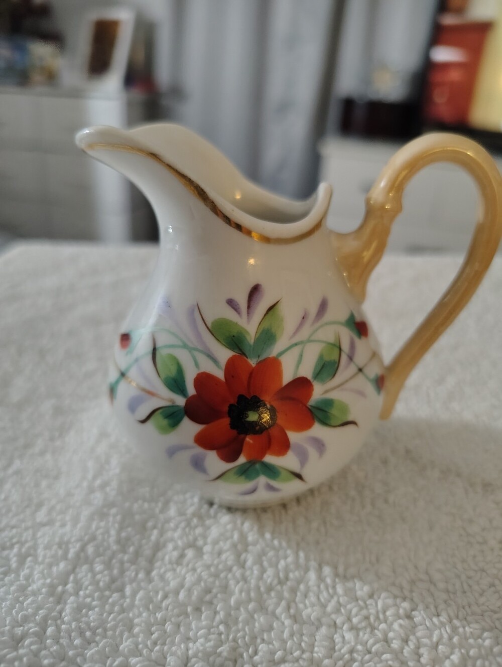 Source Unknown White Porcelain Creamer with Red Flower and Gold Handle